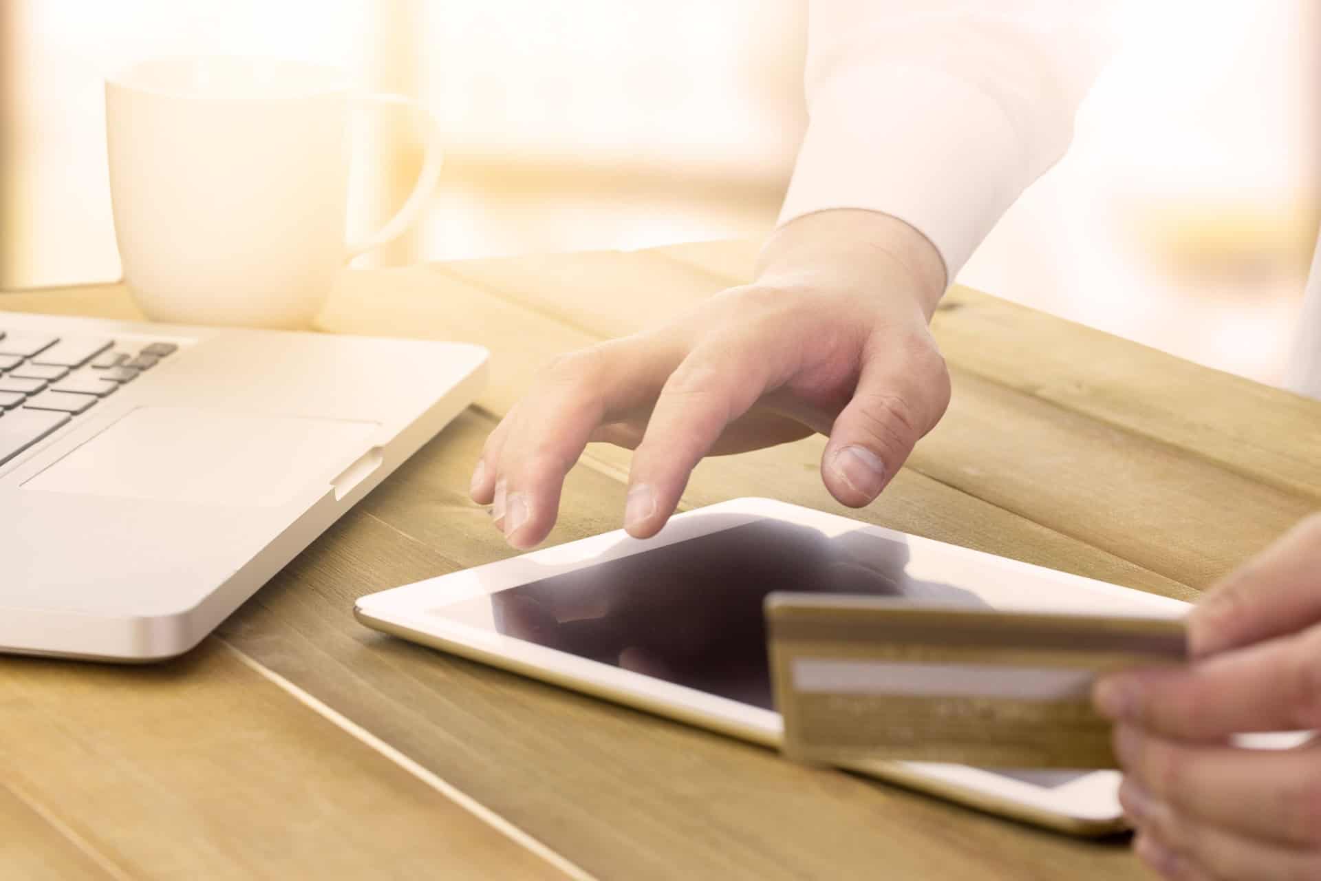 Person completes online payments for purchases