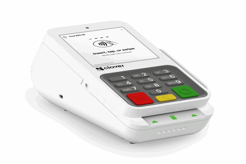 A white Clover POS system with touchscreen, keypad, payment gateway, and merchant services.